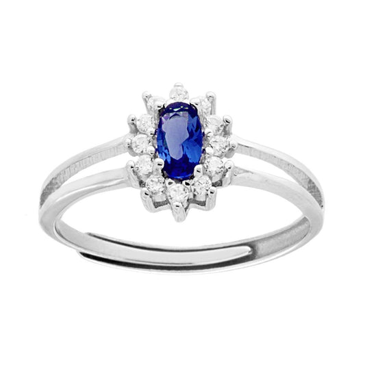 Solitärring mit ovalem blauem Saphir, umrahmt von weißen Zirkonen, aus 925er Silber rhodiniert - MeinSchmuckShop