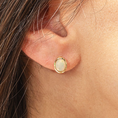 Ohrstecker 585/- Gold rhodiniert (teil) 0,9cm Opal
